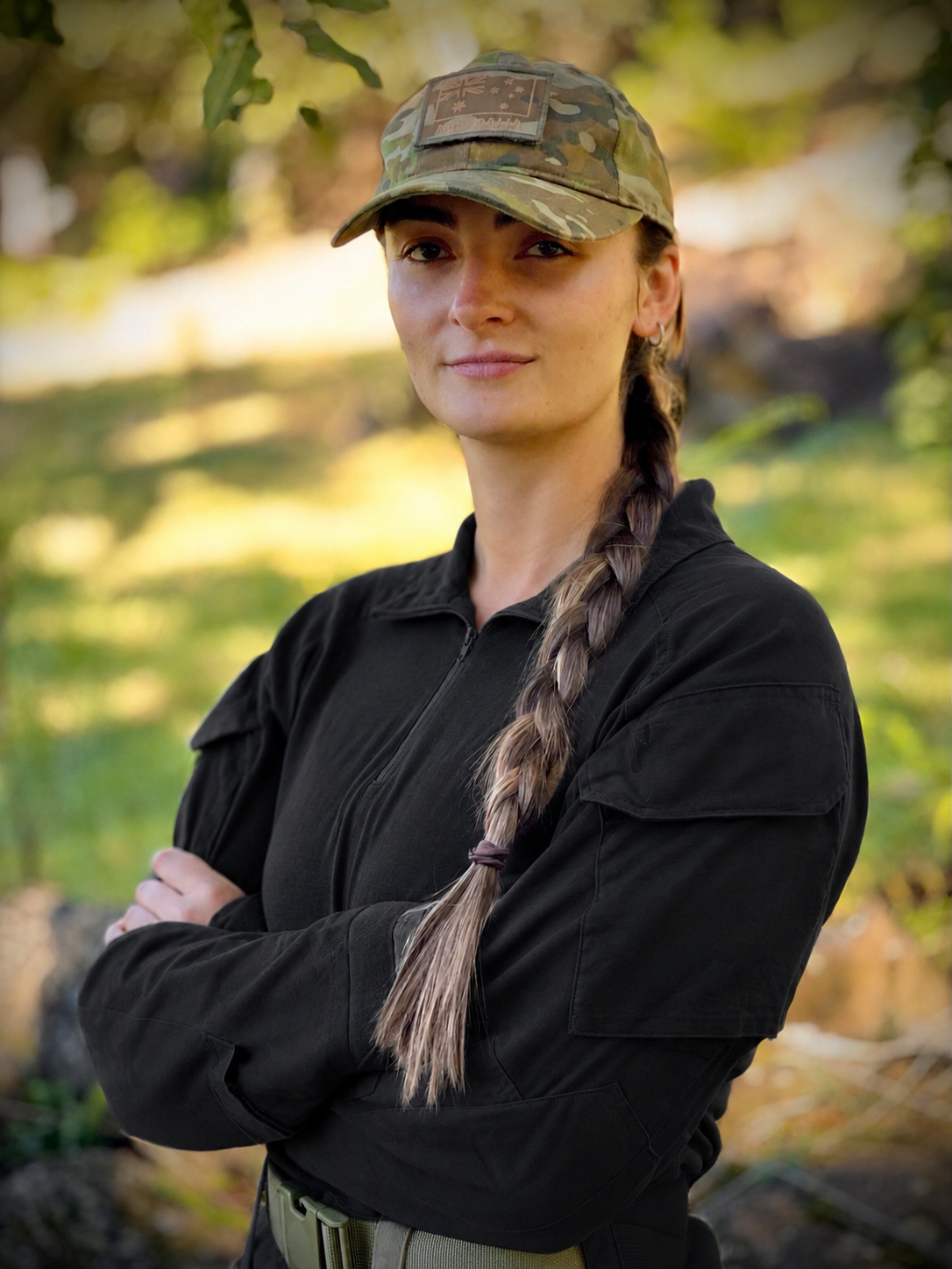 Kayla Herbert standing outdoors in Australian Army field uniform